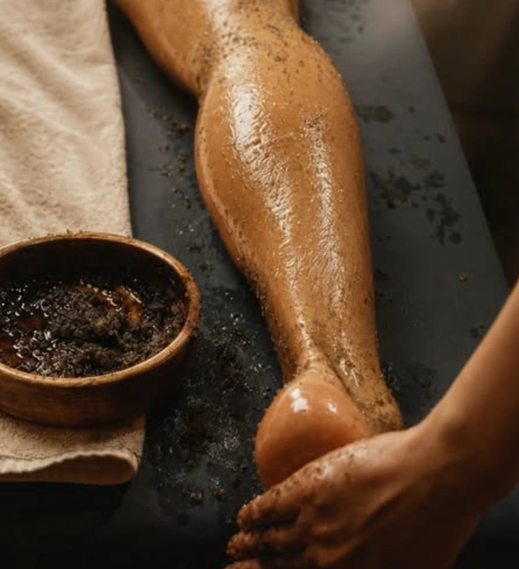 Body oil and aftercare products used after a scrub at Erothots