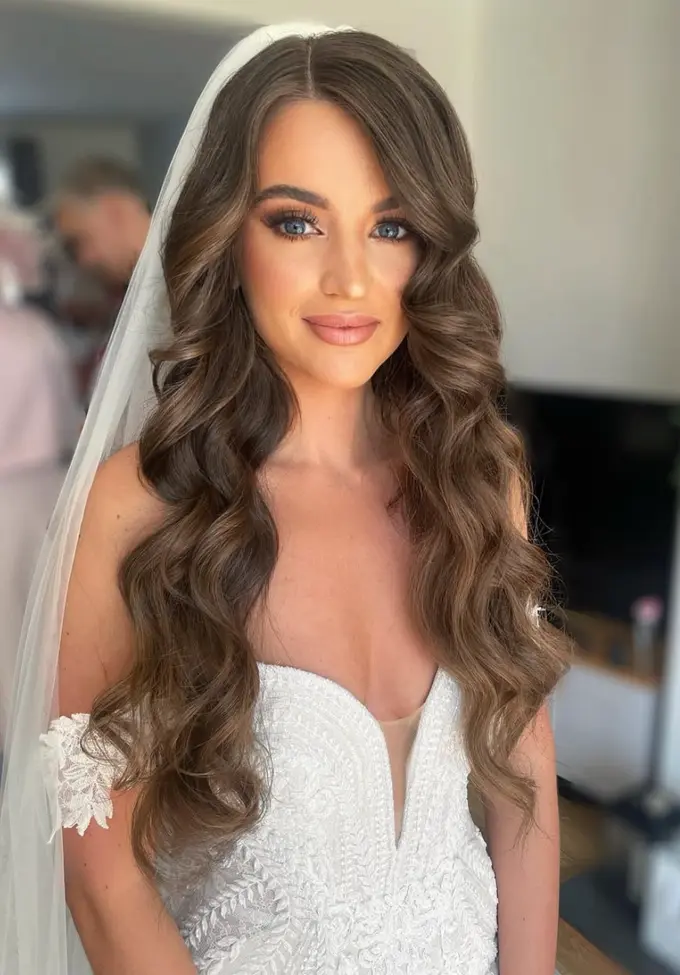 Bridal makeup checked in natural light before the wedding day