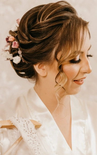 Bridal makeup being applied at the Erothots beauty salon