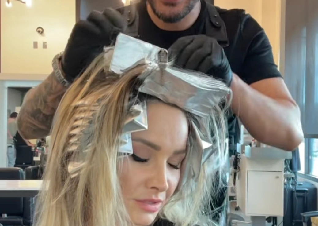 Full head hair color being processed at Erothots