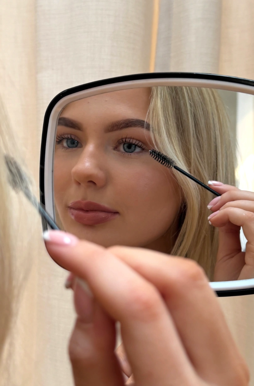Lashes molded over a silicone shield during a lash lift