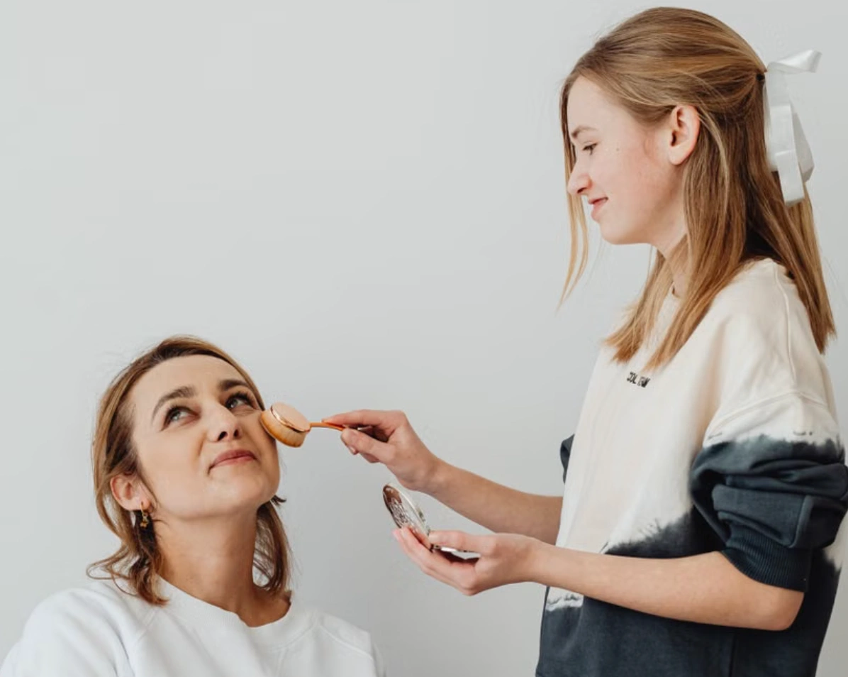 Makeup application by an artist at the Erothots beauty salon
