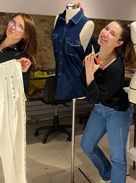 Custom tailoring and hand fitting at the Erothots fashion studio